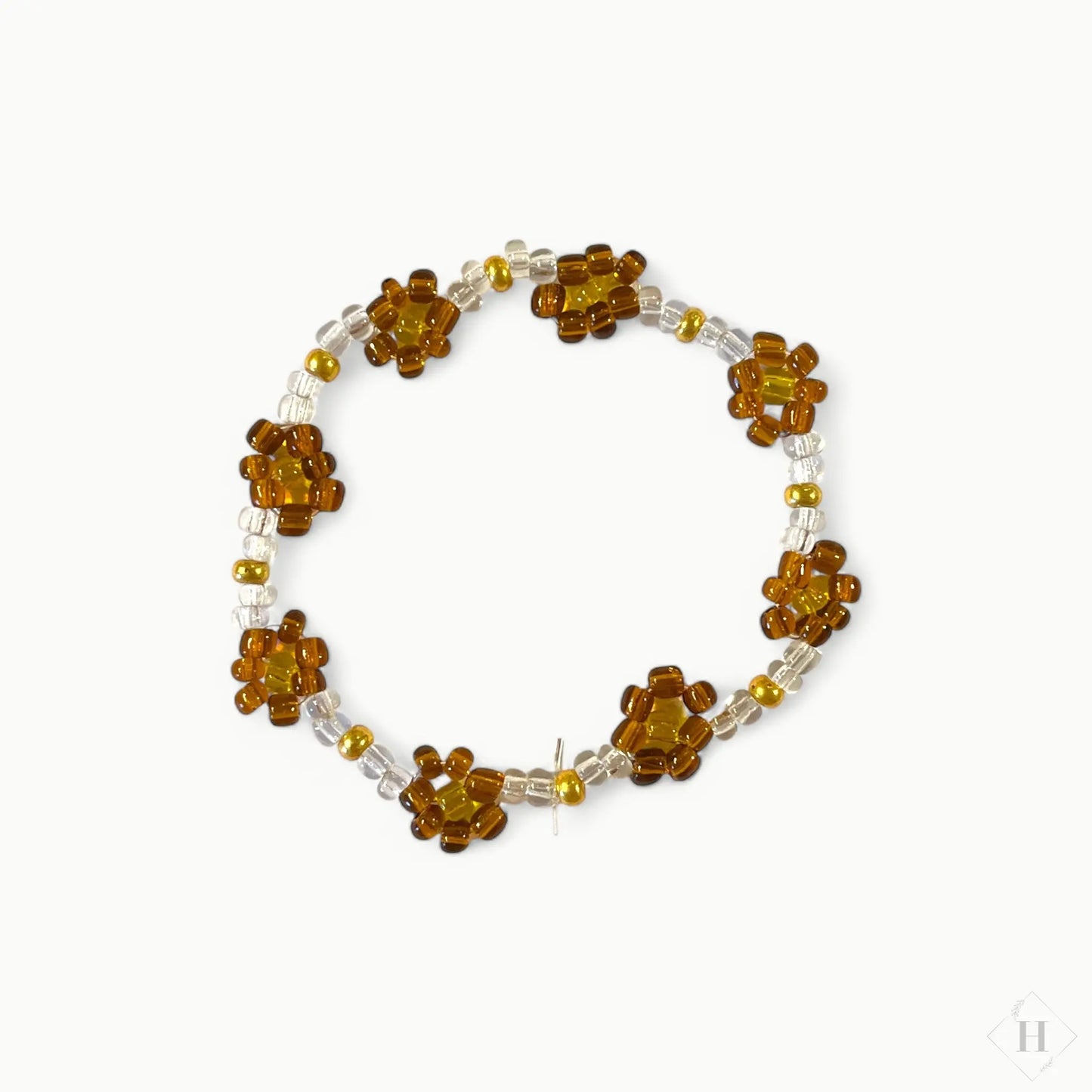 Armbånd i store glasperler - brune blomster Pen Tool Grafisk