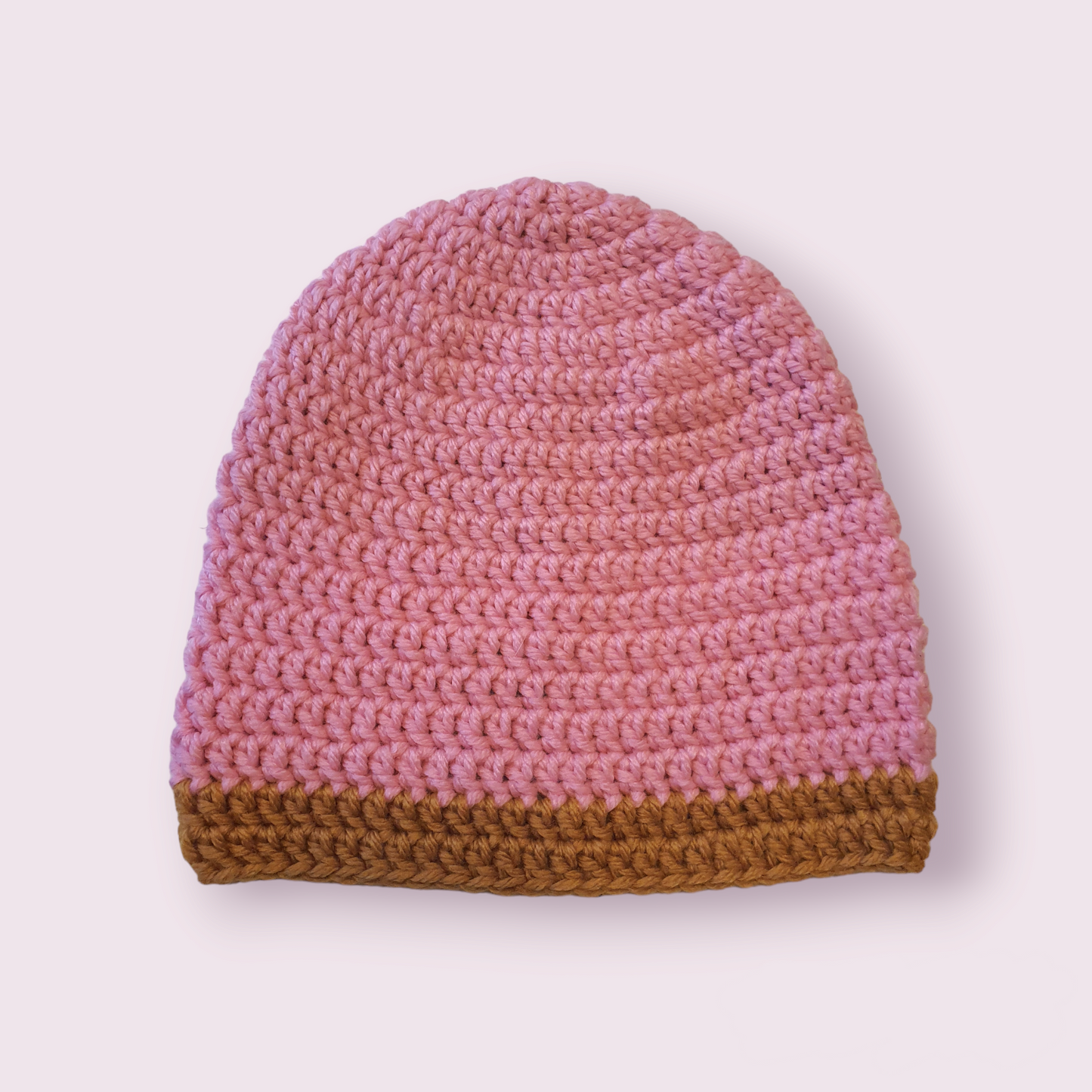 Hæklet, rosa hue med karry kant