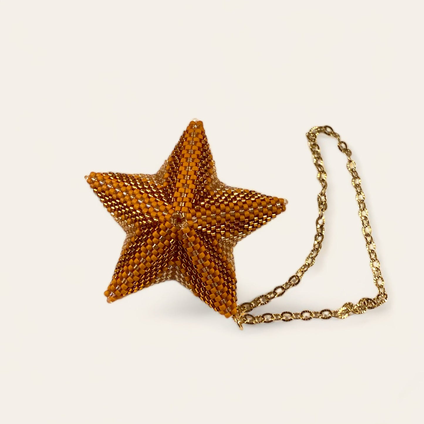 Stjerne ophæng af miyuki perler - bronze Sara Engel