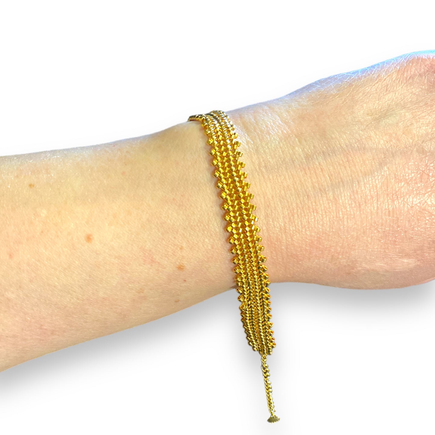 Armbånd i miyuki perler - guldbelagt