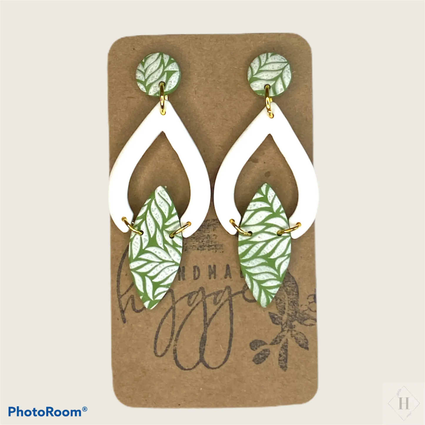 Green and white interlocked rhombuses Handmade hygge