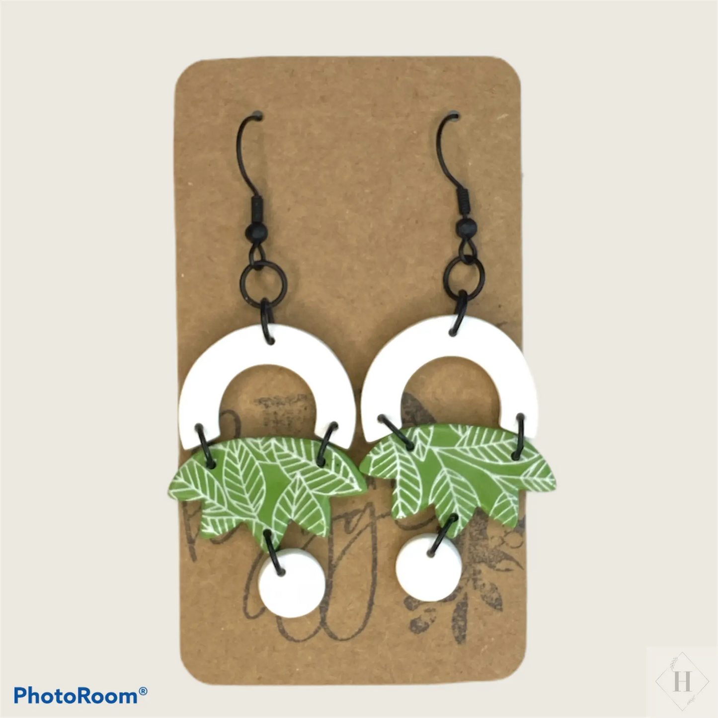 Green and white half circles with leaves Handmade hygge