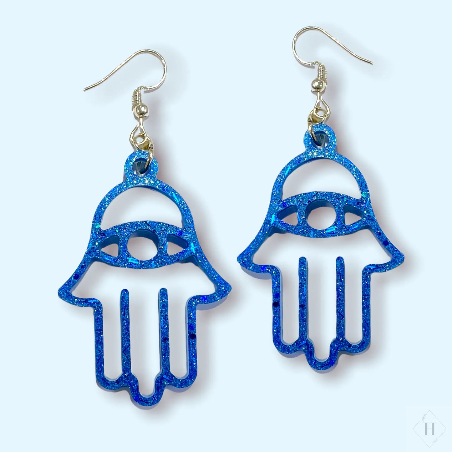 Hamsa øreringe i resin - blå Øjenguf