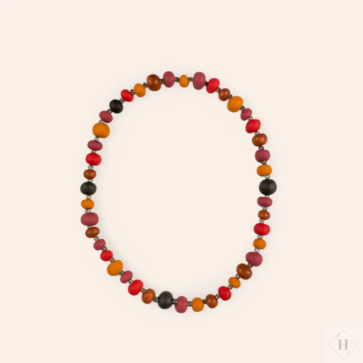 Halskæde og ørestikkere i håndlavede perler - varme røde nuancer Aldrig2ens