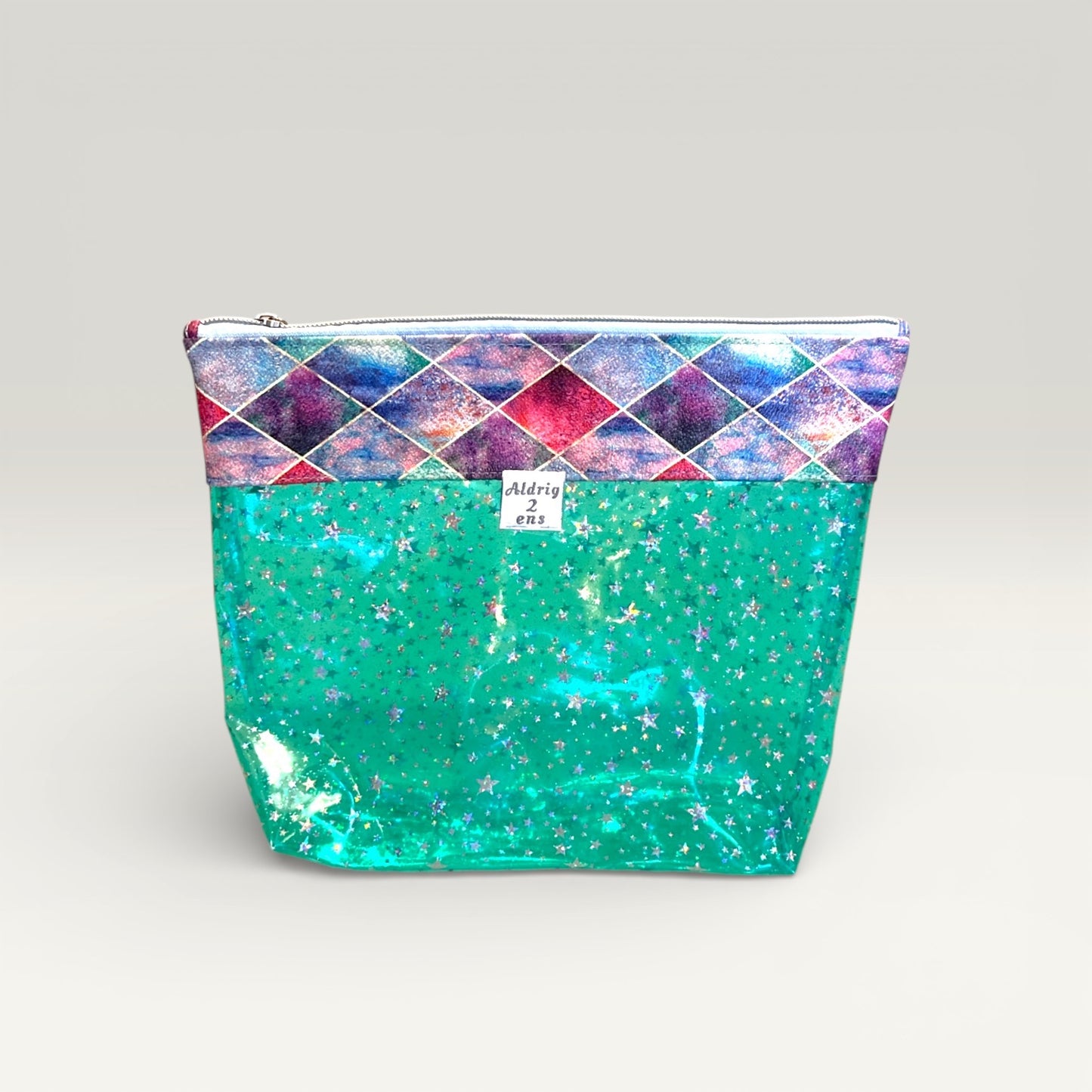 Stor toilettaske i gennemsigtig grøn vinyl med stjerner