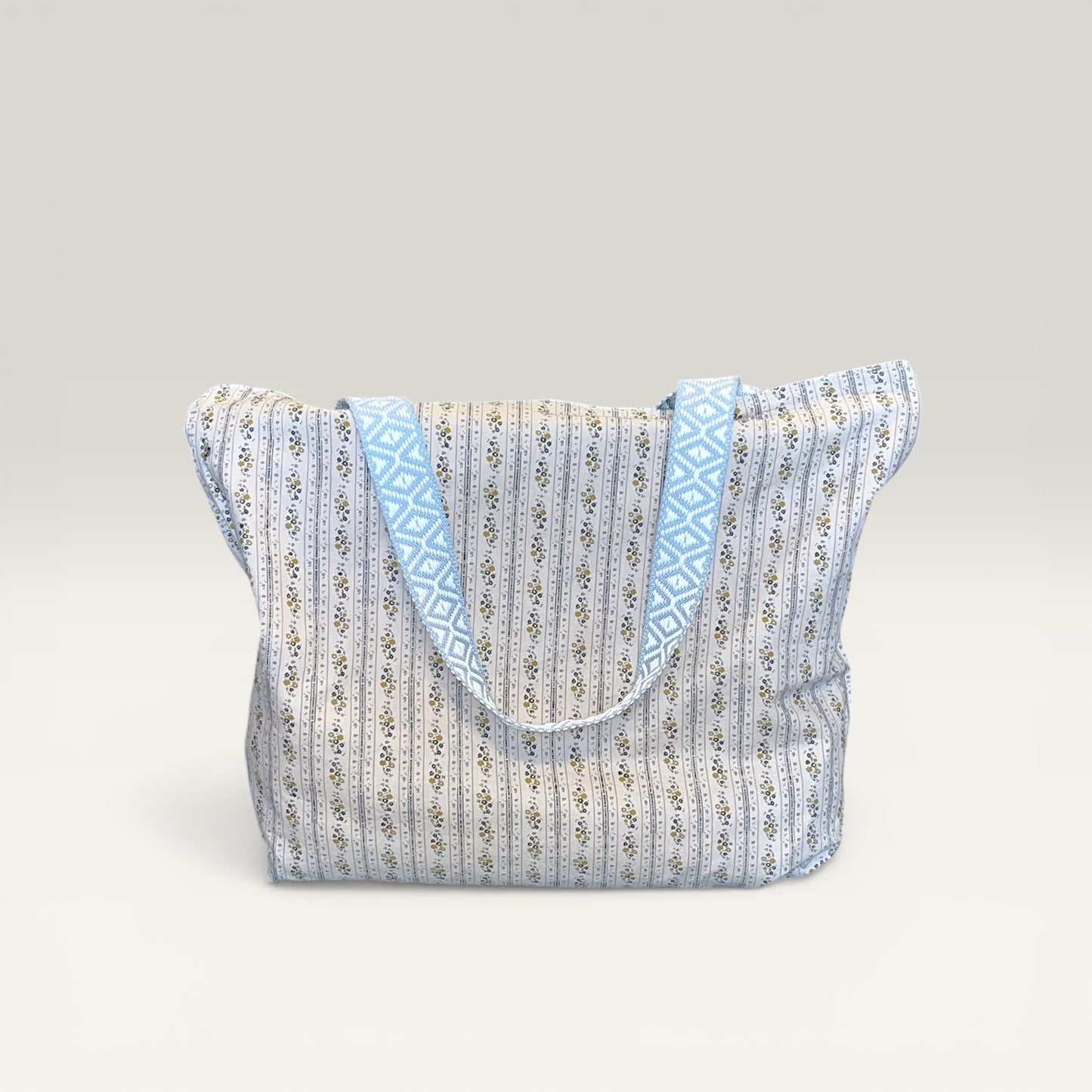 Vendbar totebag - blomstret