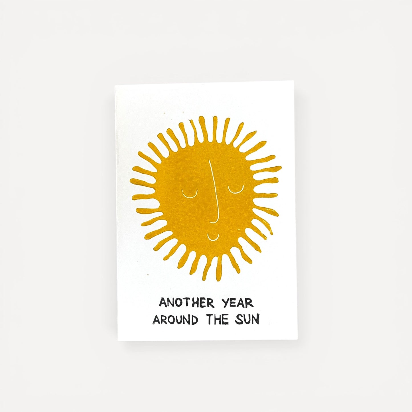 Another year around the Sun - kort I linoleums tryk