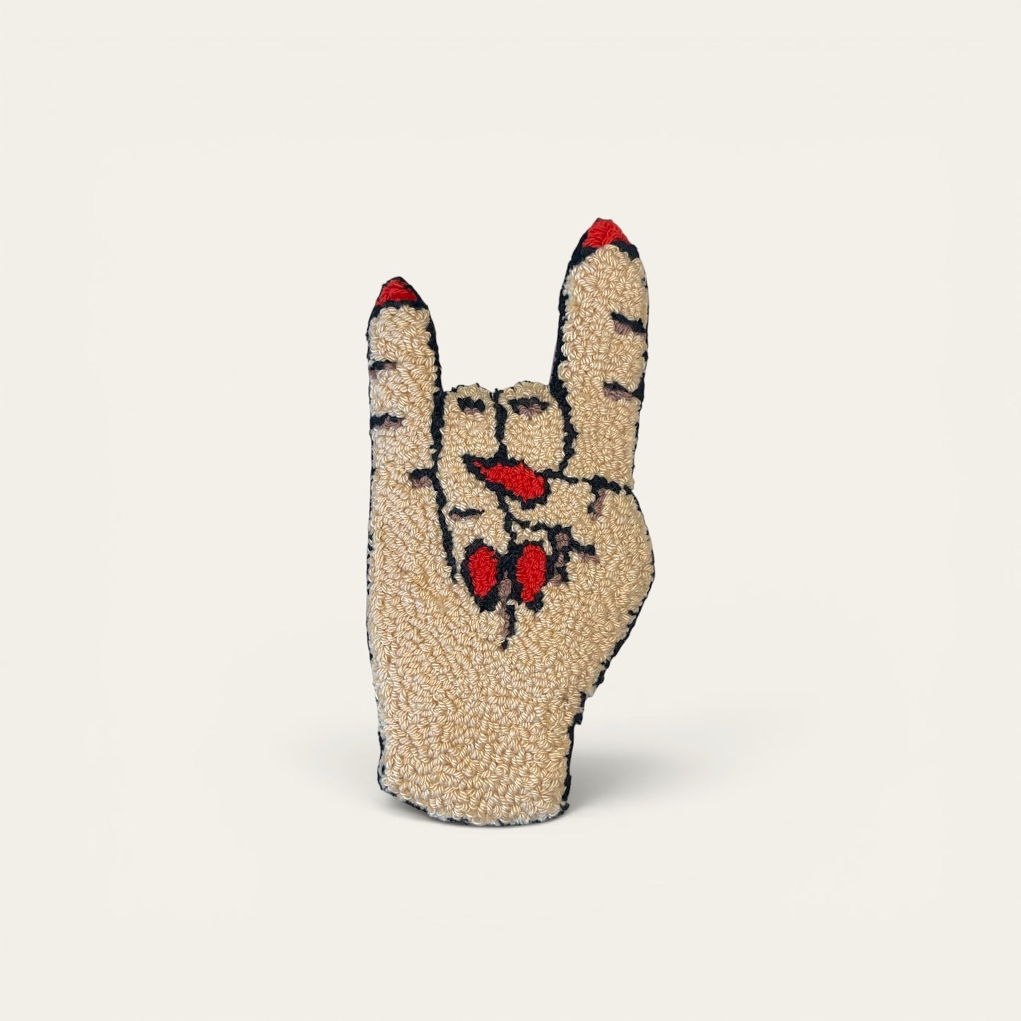 Tuftet håndtegn - “Rock on”