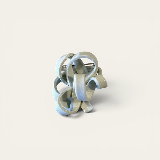 Lille broche i keramik - krusedulle