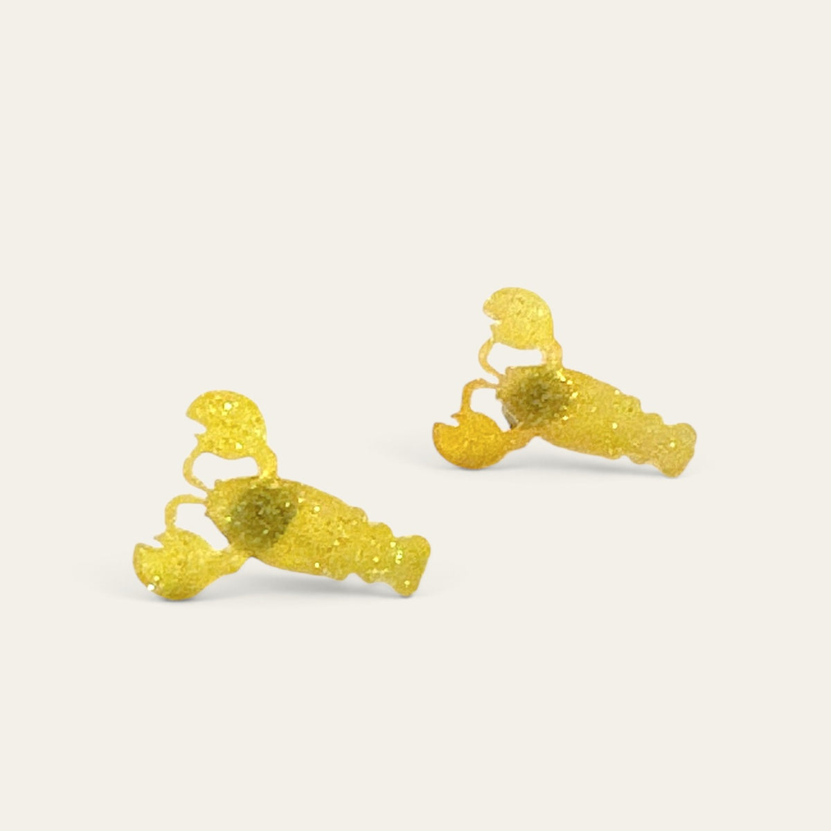 Ørestikkere med gule hummere i glimmer-resin | Øjenguf