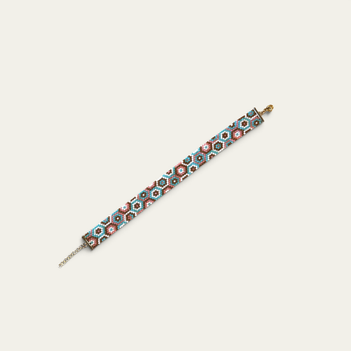 Armbånd i miyukiperler – pastel bikubemønster i lyserød og mint | Sara Engel