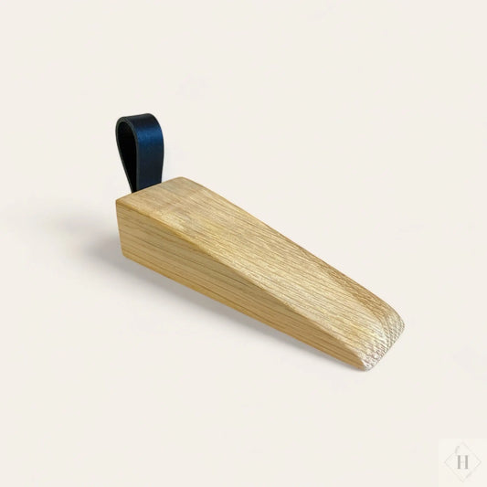 Dørstopper i eg med læderstrop Unika Nord